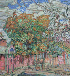 Post-Impressionist painting of autumn trees with orange leaves on a city street with pink buildings and swirling blue clouds