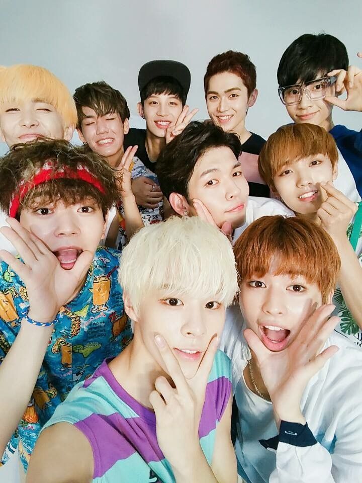 Up10tion Kpop boy group members posing together in promotional photo
