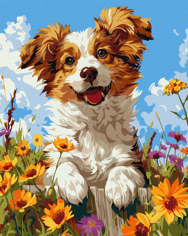 Happy brown and white puppy leaning on a fence amid colorful wildflowers and blue sky
