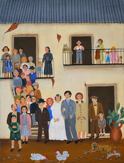Folk art painting of extended family posed on house steps and balconies in traditional naive style