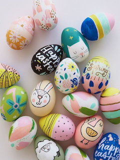 Assortment of colorful decorated Easter eggs with painted designs and patterns