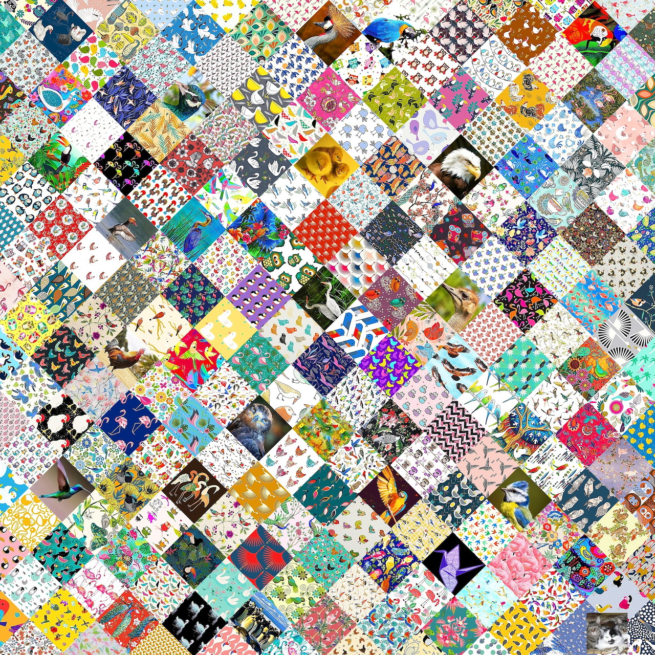 Colorful patchwork quilt with diverse fabric patterns in diamond arrangement