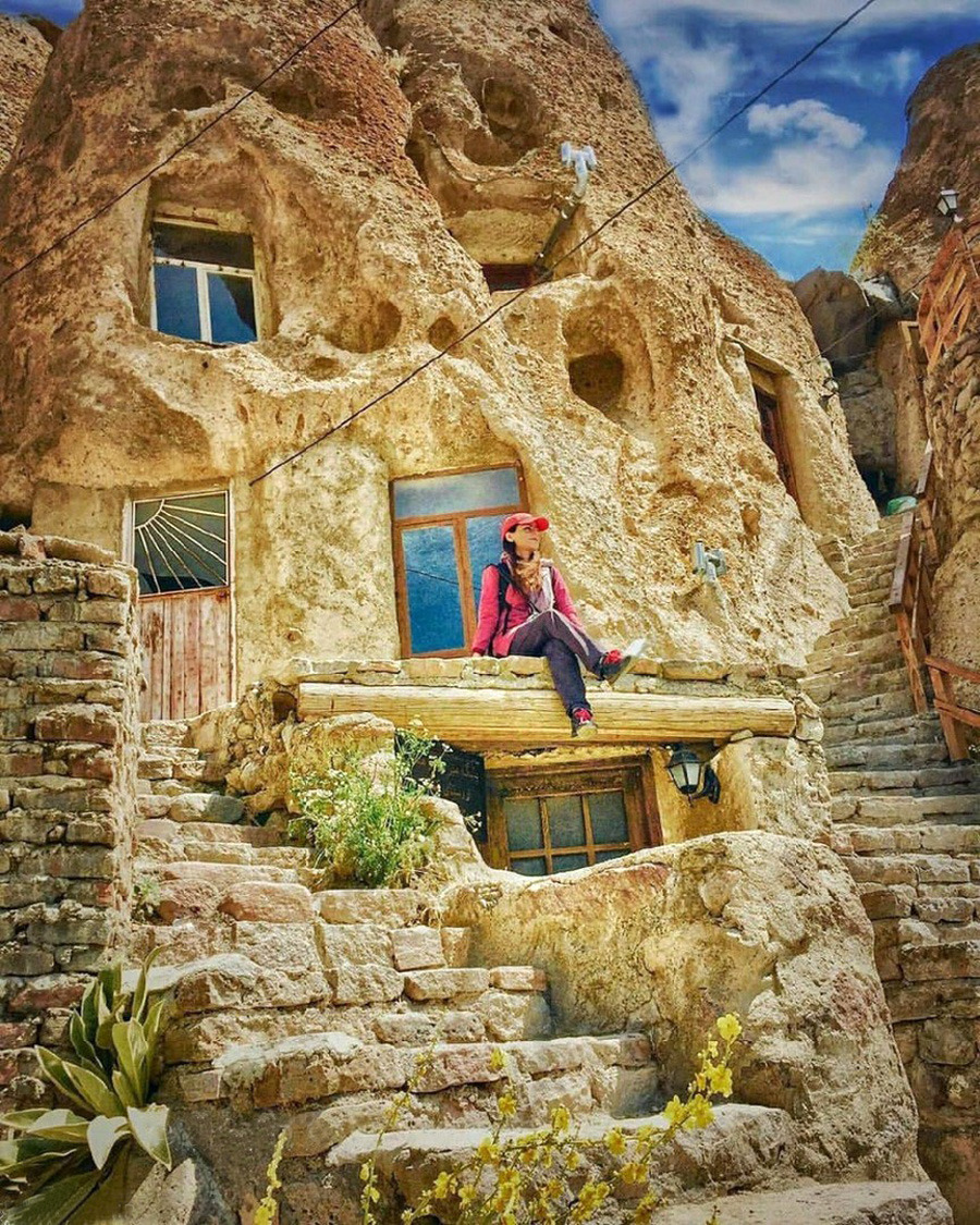 Cave houses carved into volcanic rock cones in Kandovan village, Iran