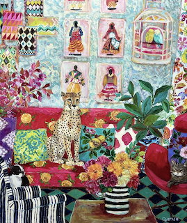 Colorful painting of leopard on patterned red sofa in eclectic room with plants and decorative wall art
