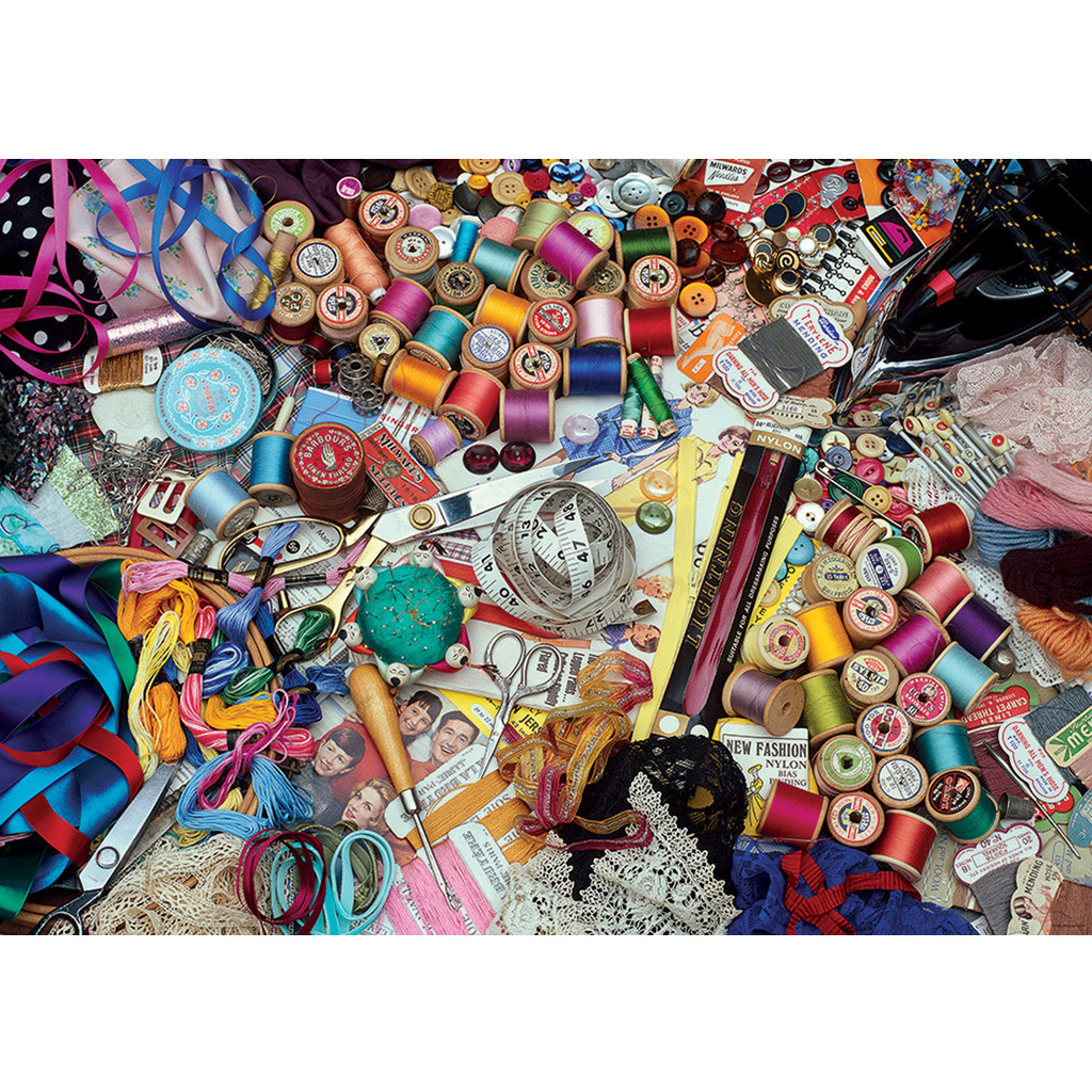 Assorted colorful sewing supplies and craft materials spread across a table