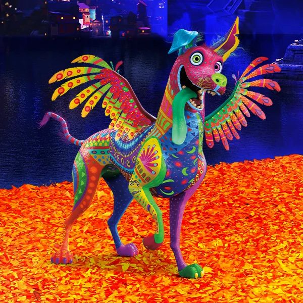 Colorful alebrije sculpture of a winged dog with intricate patterns on orange flower petals