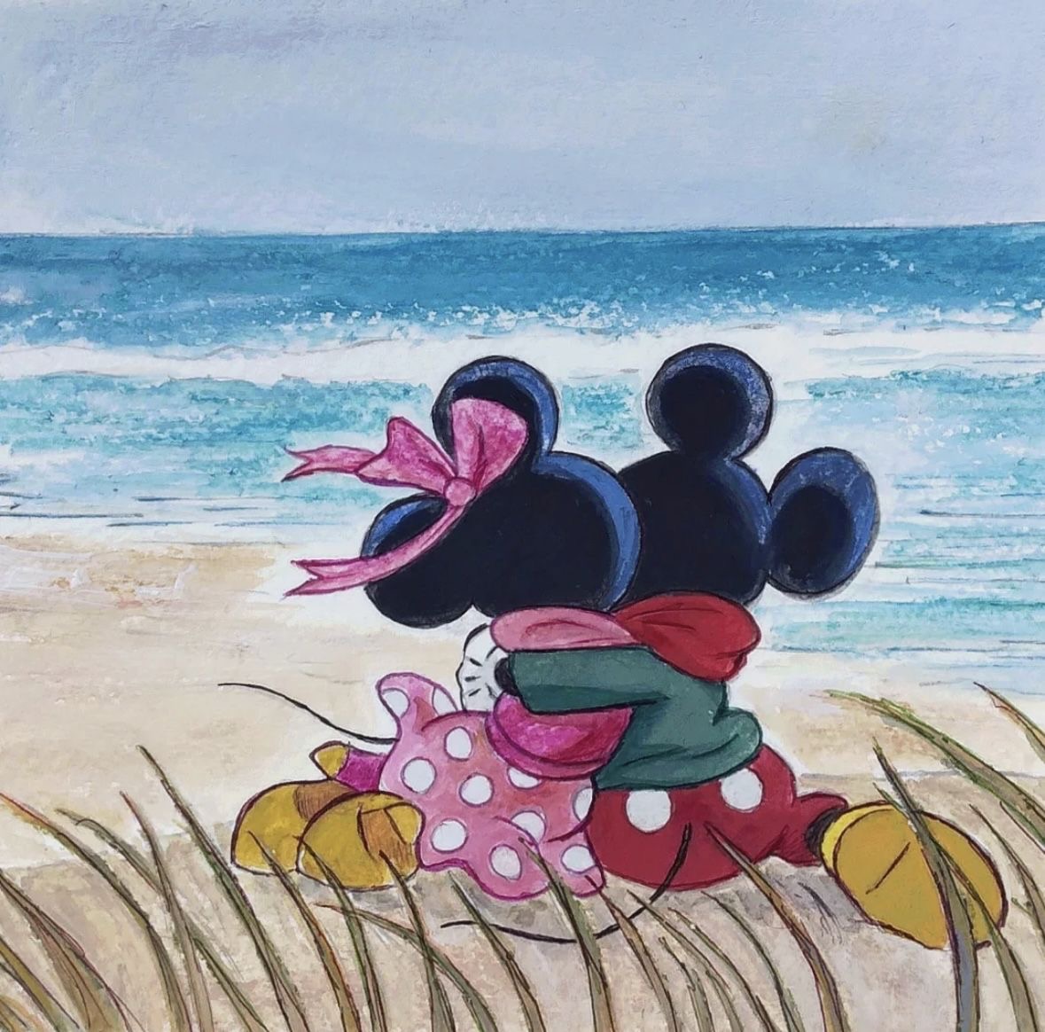 Mickey and Minnie Mouse sitting on beach viewing ocean