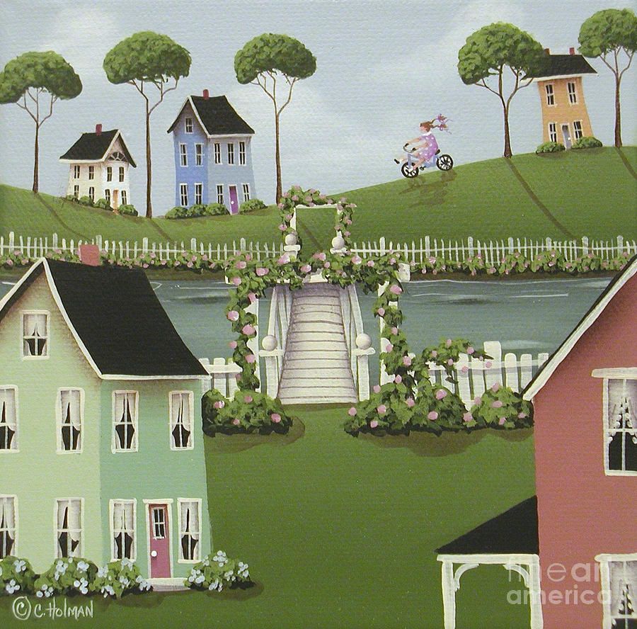 Folk art village with pastel houses, pond, white fence, trees and cyclist