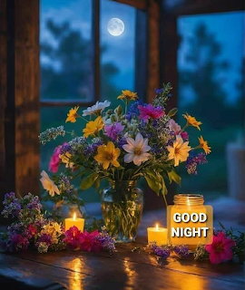 Colorful flower bouquet in vase with lit candles on wooden table at night with full moon in background