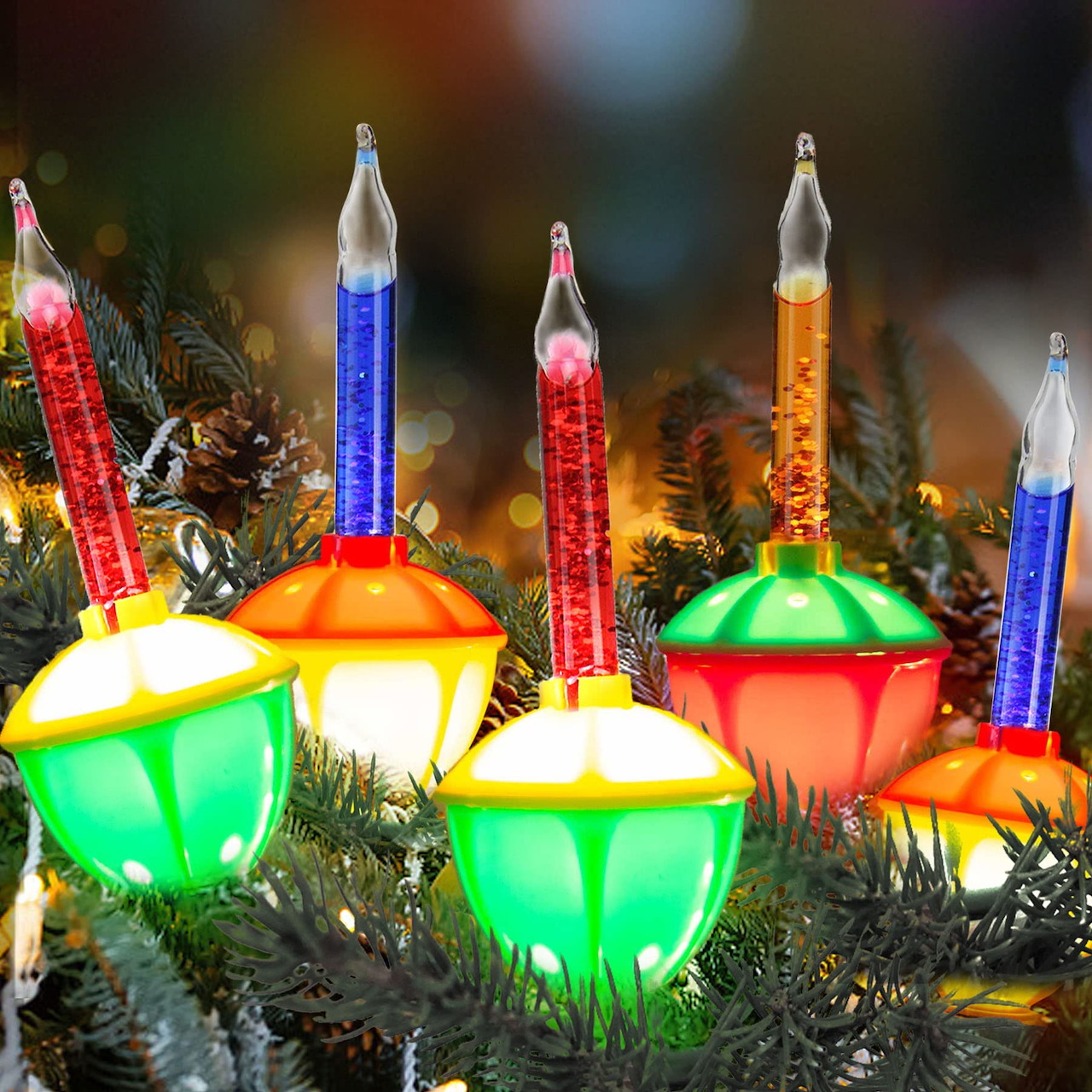 Colorful vintage Christmas bubble lights glowing on evergreen garland