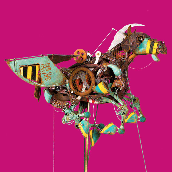 Steampunk mechanical horse sculpture made of gears and colorful metal parts against magenta background