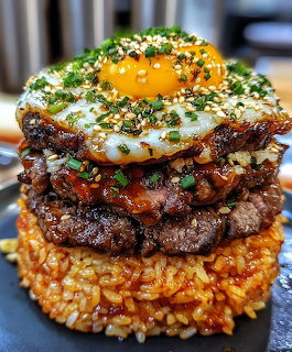 Stacked Korean-style rice burger with beef, egg, cheese, and herbs on a dark plate