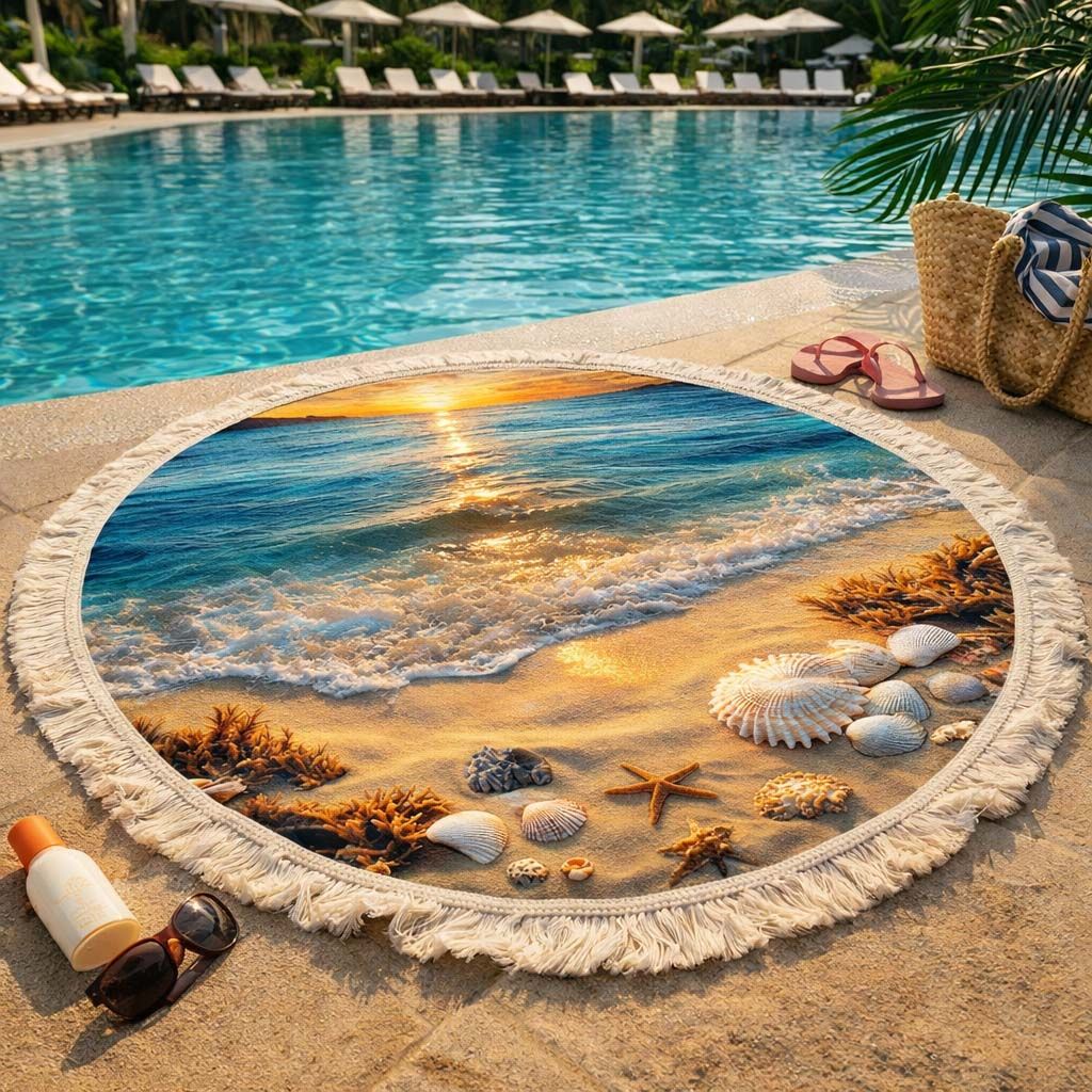 Round beach towel with ocean wave print on pool deck next to turquoise pool