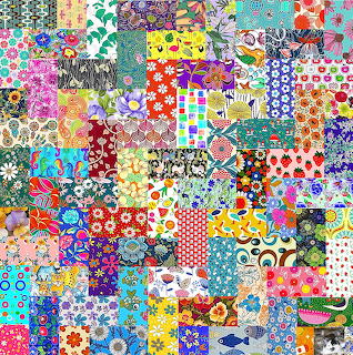 Colorful patchwork quilt with various floral and geometric patterns in small squares