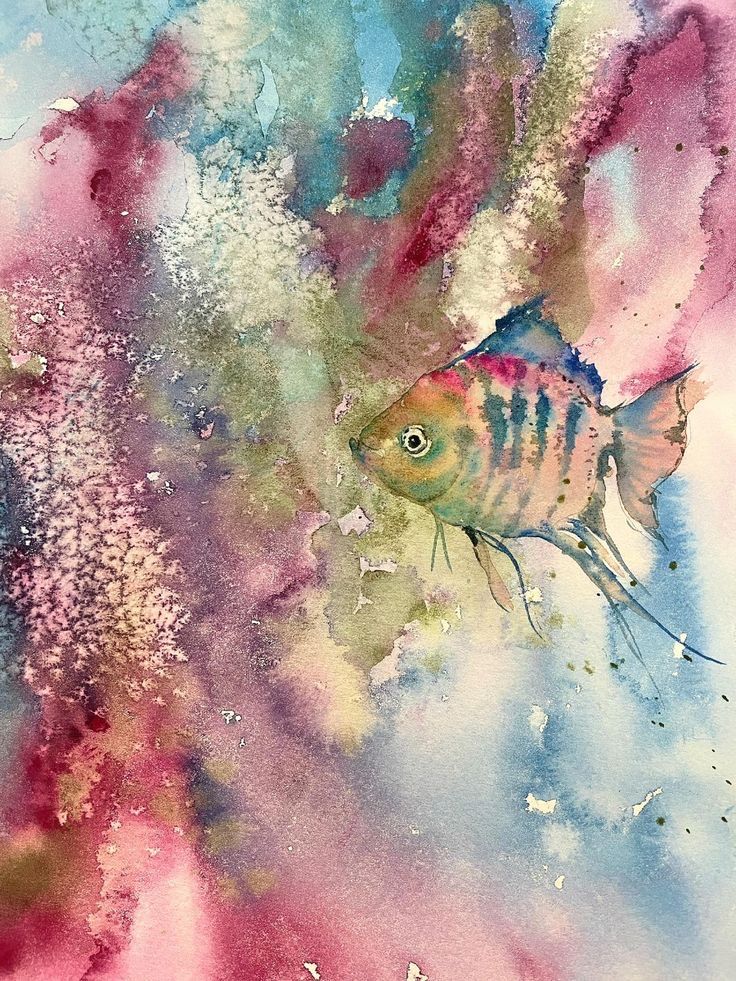 Watercolor painting of a striped tropical fish among coral in pink, blue, and gold tones