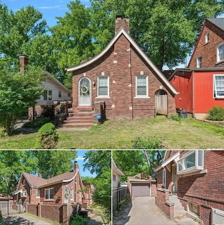 Red brick bungalow with peaked roof, white front door, and arched window under blue sky with green trees