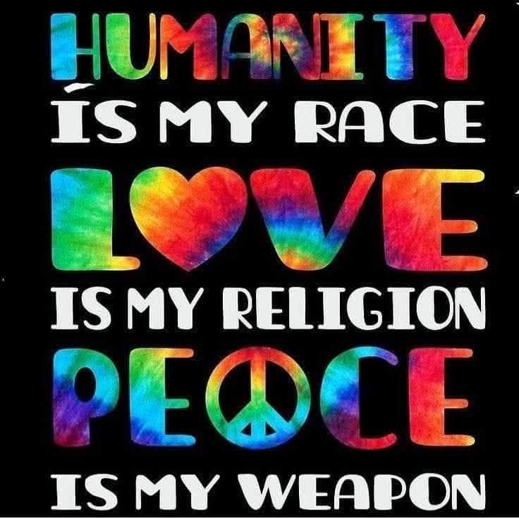 Rainbow colored text reading humanity is my race, love is my religion, peace is my weapon with heart and peace symbols