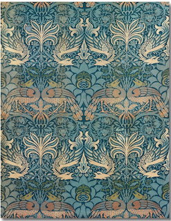 Symmetrical peacock and dragon pattern in teal and gold with ornate floral details
