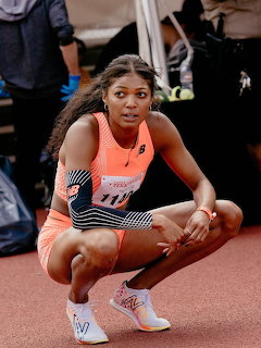 Female Track Athlete Resting