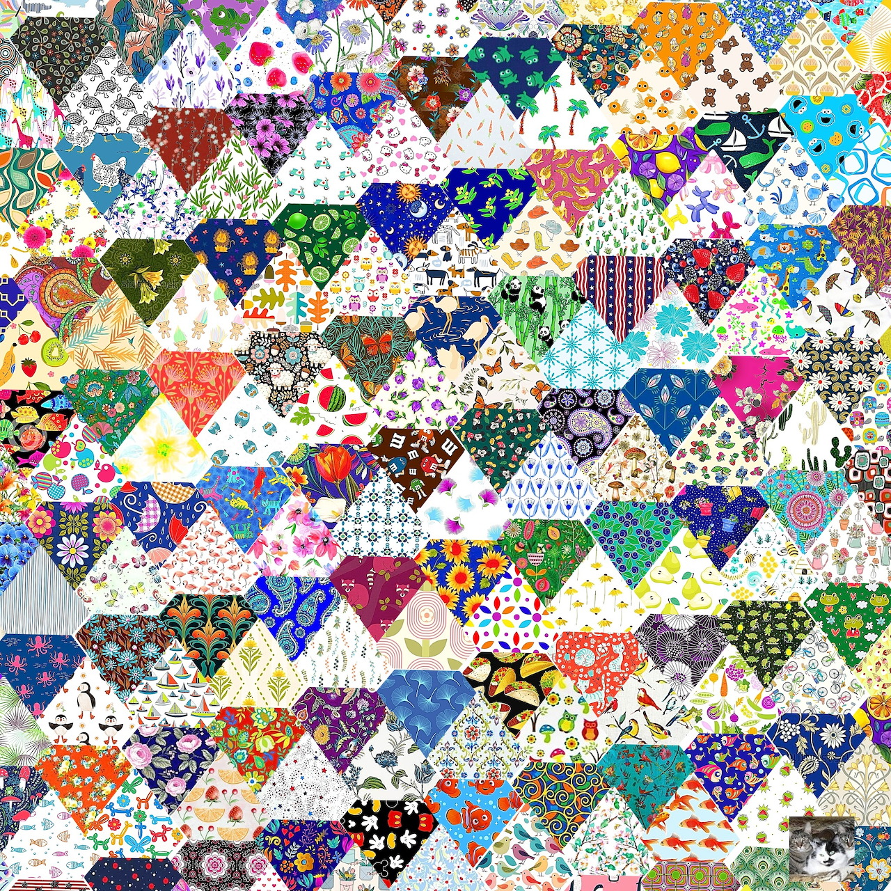 Colorful patchwork quilt pattern made of many small patterned triangles