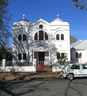 White synagogue with Moorish domes and arched facade in Stellenbosch, South Africa