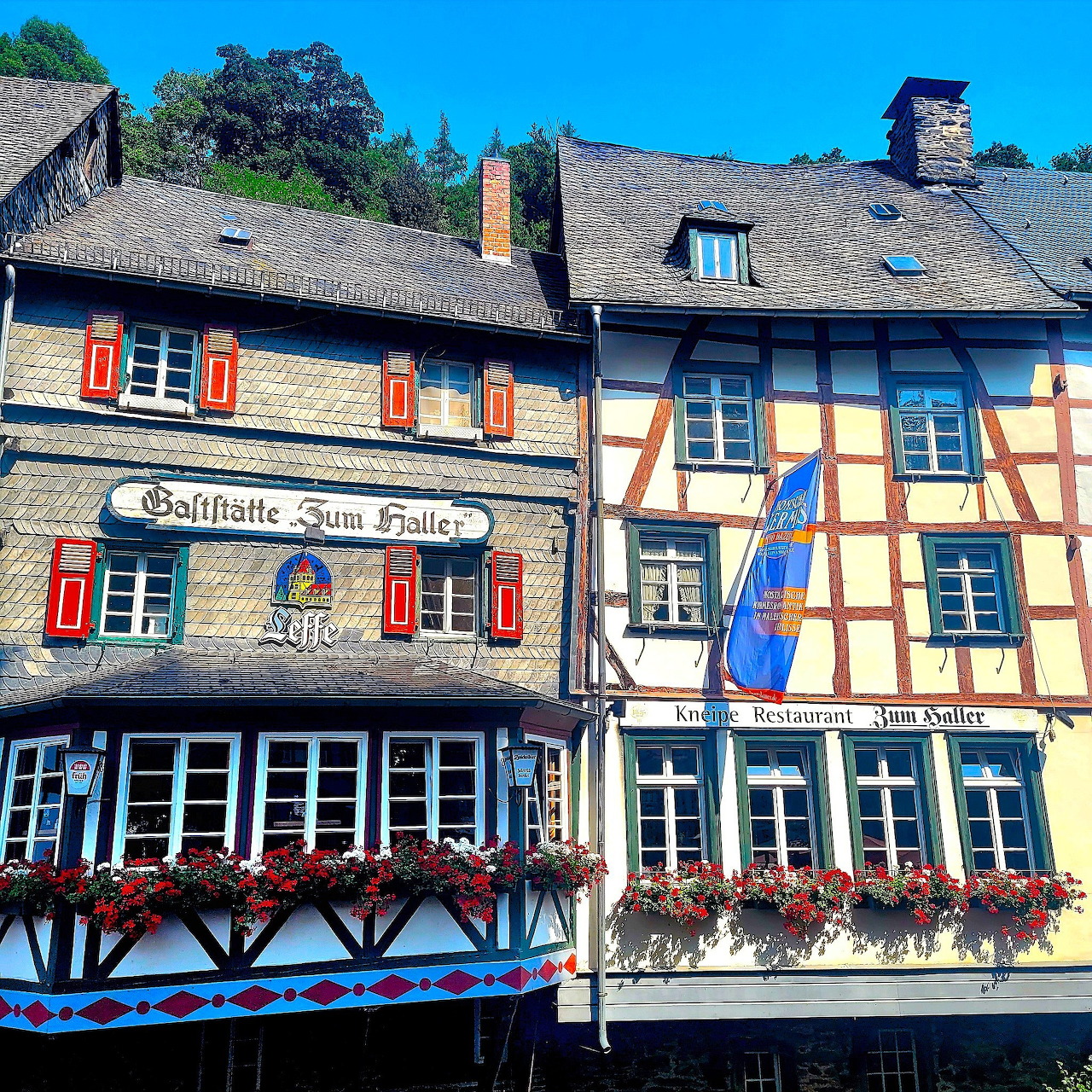 Historic half-timbered houses with colorful facades in Monschau, Germany