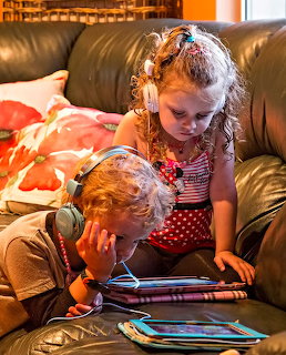 Girls Using Tablets
