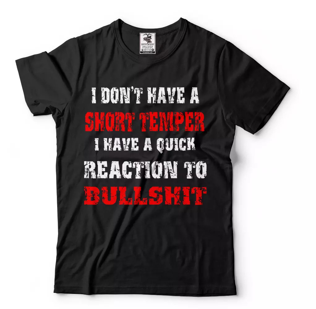 Black graphic T-shirt with a white and red slogan printed on the front