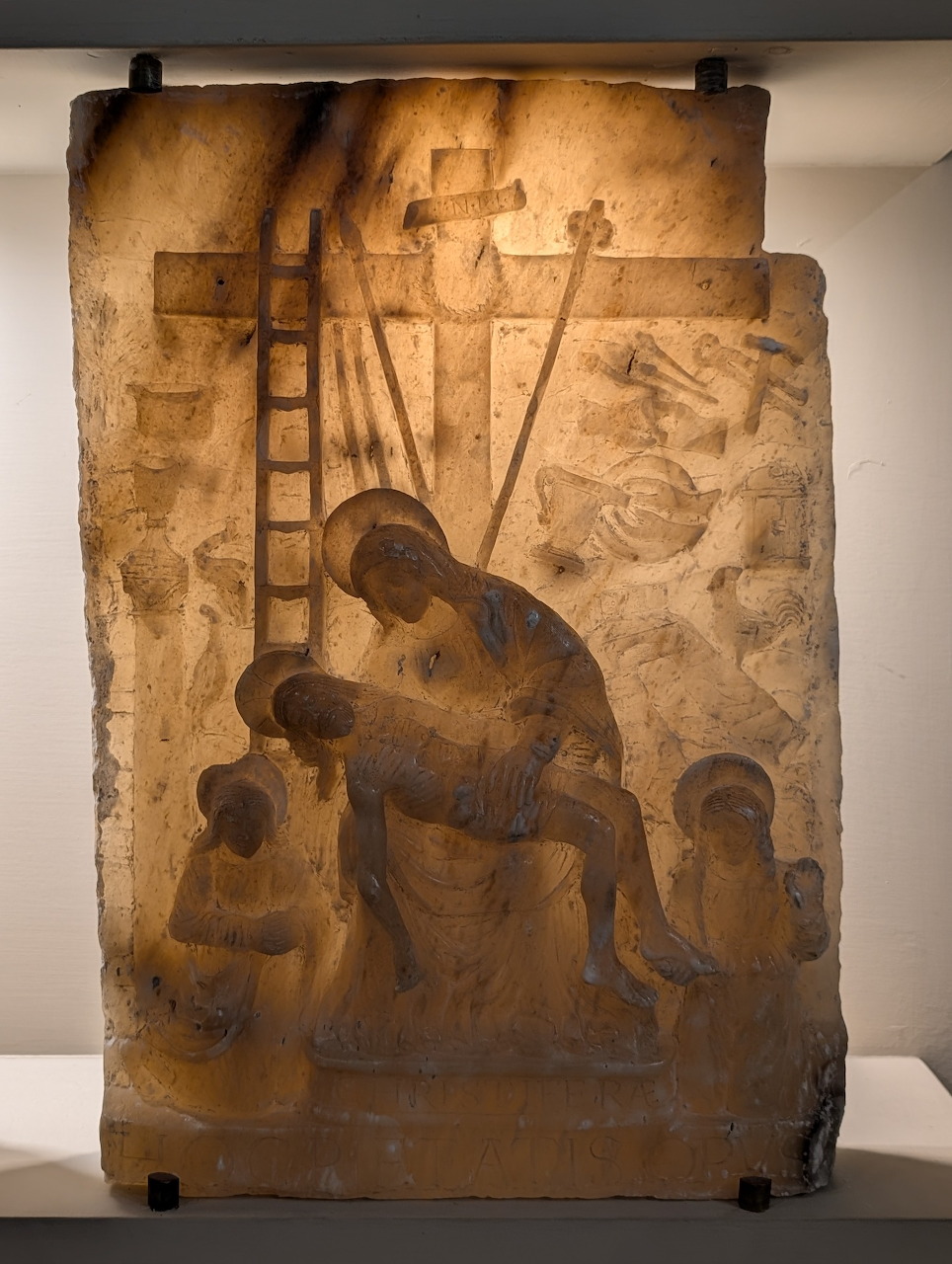 Medieval stone bas-relief of the Descent from the Cross with carved figures, Museo Diocesano, Salerno