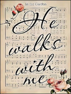 Vintage sheet music print with cursive text 'He walks with me' and pink rose decorations on aged paper