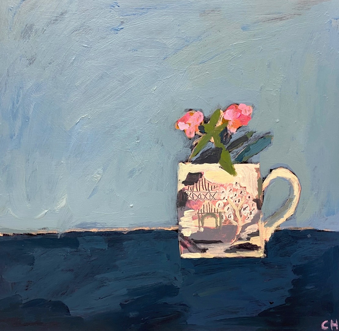 Still life painting of pink flowers in decorated ceramic cup on dark blue surface against light blue background