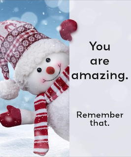 Smiling snowman in red hat and scarf next to the text 'You are amazing. Remember that.' on a snowy background.
