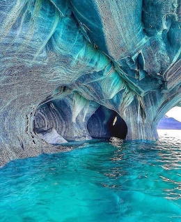 Swirling blue marble cave with turquoise water reflection, Patagonia Chile