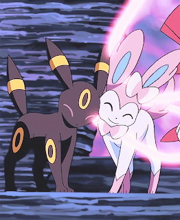 Umbreon and Sylveon Pokemon standing side by side with glowing pink and purple aura background