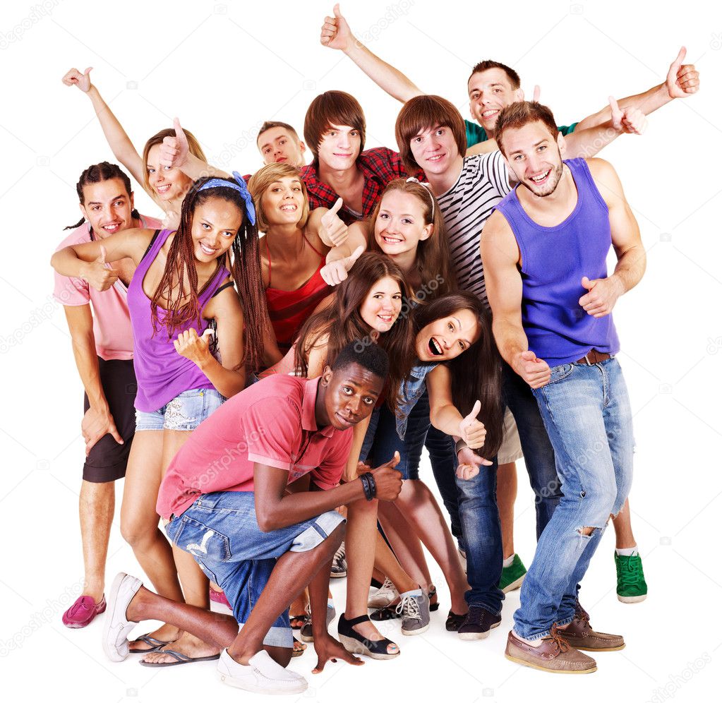 Group of smiling young adults posing together on a white background