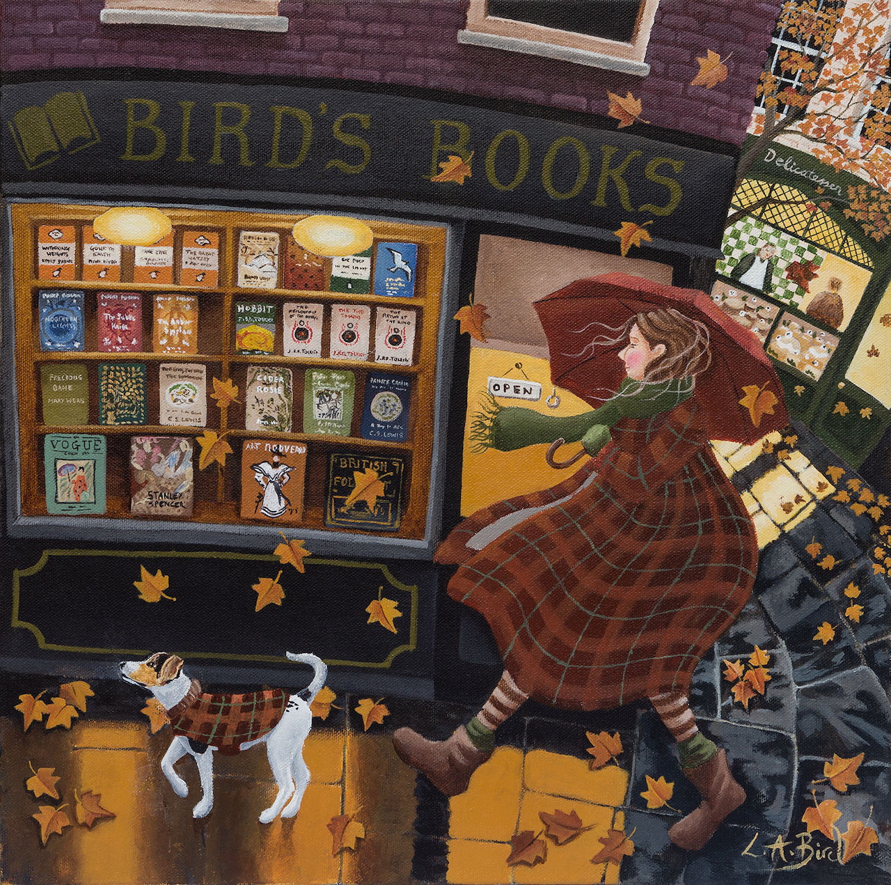 Person in plaid coat reading by Bird's Books storefront with white cat and autumn leaves