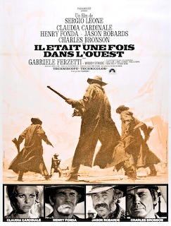 Once Upon a Time in the West movie poster with silhouetted cowboys and cast photos