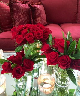 Red Roses in Glass Vases
