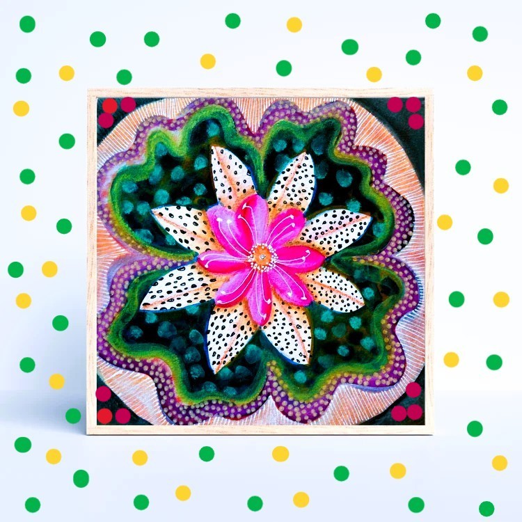 Colorful abstract mandala flower with pink center, white dotted petals, teal and green layers on polka dot background