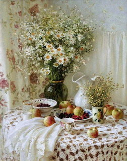 Still life painting of white daisies in a vase on a lace table with fruit, teacups, and a white pitcher.