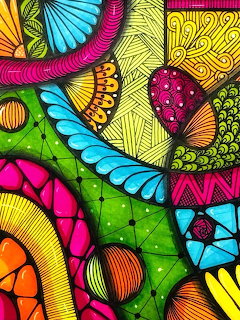Colorful abstract zentangle with intricate patterns in pink, yellow, green, blue, and orange