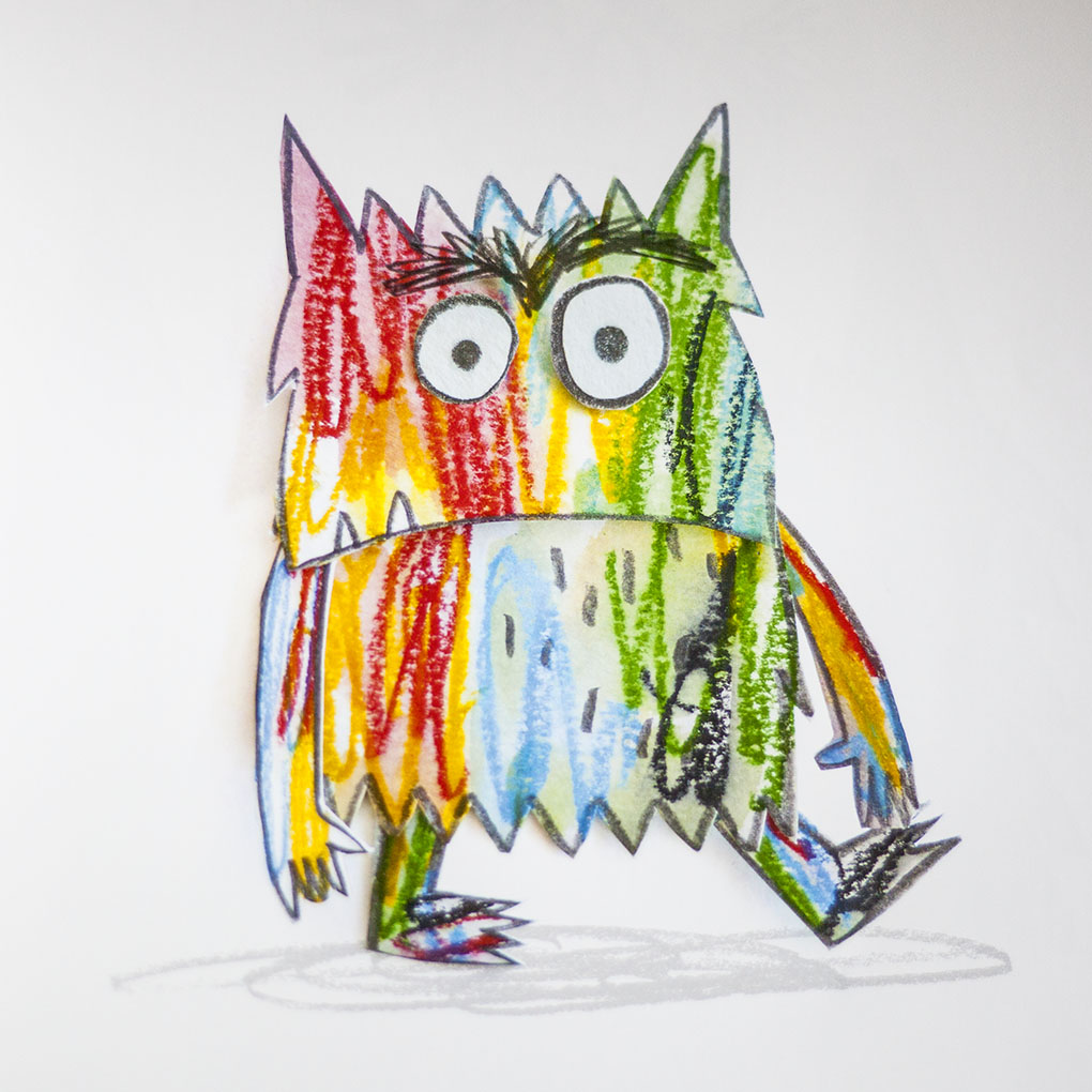 Colorful crayon drawing of a cartoon owl with rainbow stripes on a white background
