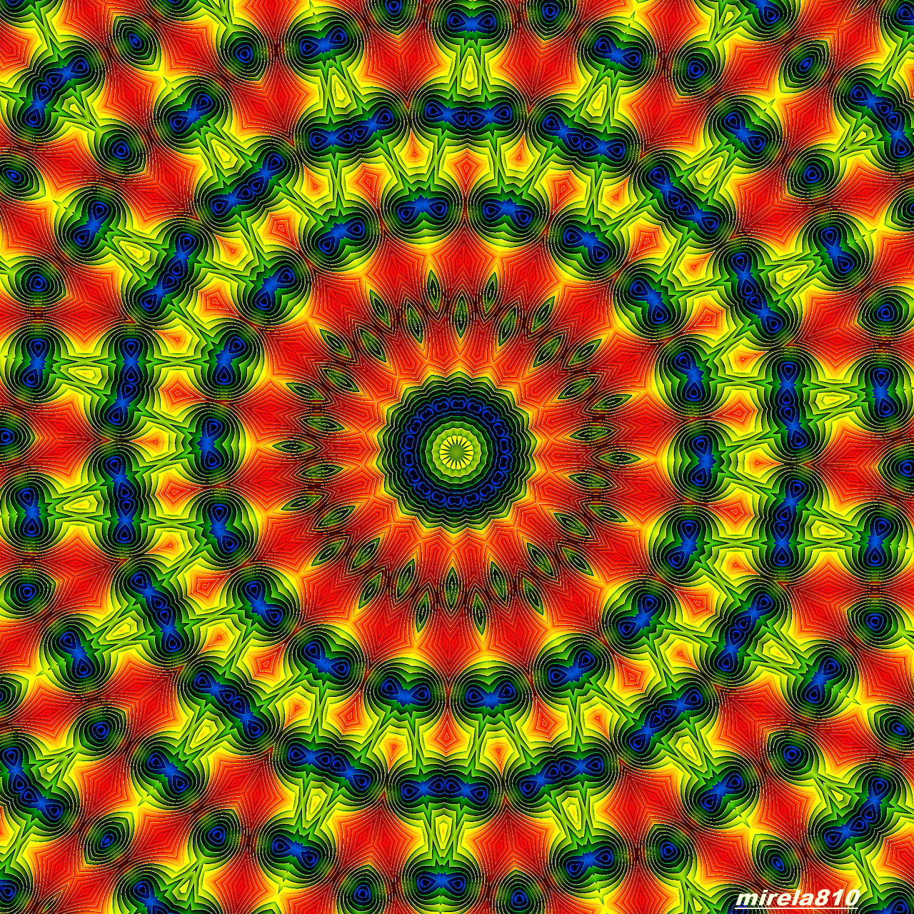 Colorful symmetrical mandala pattern with rainbow concentric circles radiating from dark blue center