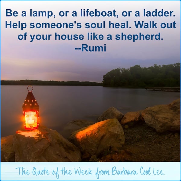 Rumi quote over a dusk lake scene with a glowing lantern on rocks by the water