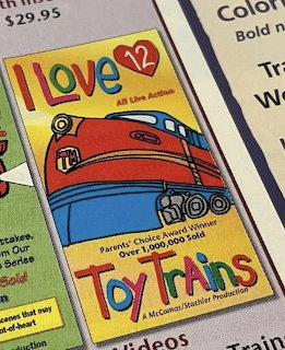 VHS cover for I Love Toy Trains 12 showing an illustrated red train engine with colorful letering