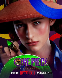 Close-up portrait of a character wearing a red straw hat with blue ribbon, holding a small item, with One Piece logo below