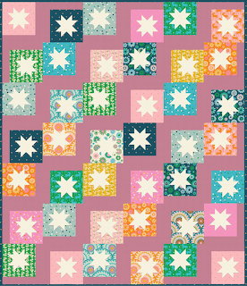Patchwork quilt with white star blocks on colorful floral and solid square backgrounds