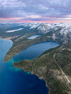 Emerald Bay at Lake Tahoe with turquoise water, pine-covered shores, and a small island.