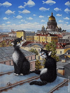 Two black-and-white cats on rooftops above a historic city with a domed cathedral and clouds