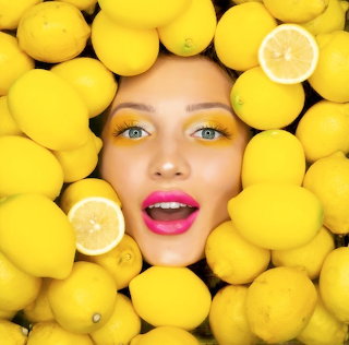 Woman Among Lemons